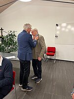 Præsidenten tildeler jens Poulsen - 50 års nålen